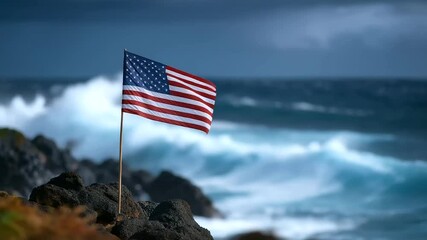Dramatic scene of an American flag waving atop a rugged coastal cliff against a backdrop of volcanic rocks and a stormy sky. - Powered by Adobe