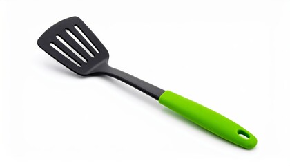Slotted spatula with green handle isolated on white background, kitchen utensil