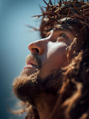 Jesus christ wearing crown of thorns looking up to heaven