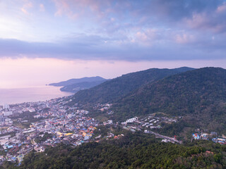 Fototapeta premium Aerial view of beautiful sunset sky over sea at Patong bay Phuket city Thailand