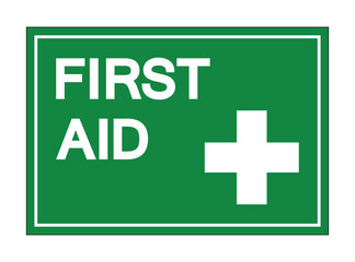 Green First Aid Sign with White Text and Cross for Emergency Situations