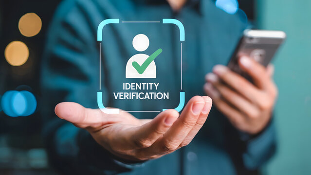 Securing digital identities using verification displayed above open hand with mobile phone during process with blue background.