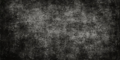 Dark, old, and rough, this black grunge paper texture creates a vintage wall pattern backdrop