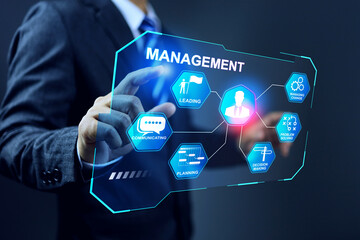 management concept with businessman working on virtual screen to manage company organization to achieve performance target