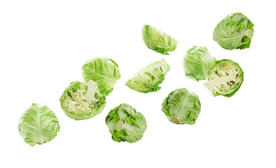 Fresh ripe cabbages falling on white background