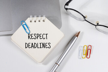 Office Note “Respect Deadlines” Set on Office Desk – Accountability Concept