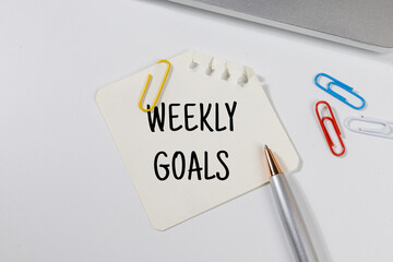 Office Note “Weekly Goals” Set on Office Desk – Planning & Focus Concept