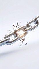 Obraz premium A broken metal chain link with shattered pieces isolated on white background