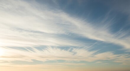 Fototapeta premium Stunning Sky Wispy Clouds at Sunset, Serene Nature Photography