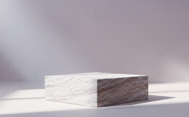 Marble cube on white surface with soft shadows against a light background.