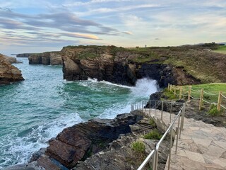 Cathedrals beach during high tide, Ribadeo, Spain. The whole beach and the bottom of stairs all...