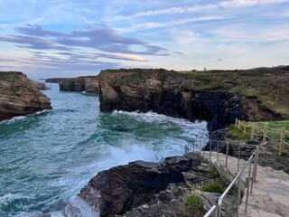 Cathedrals beach during high tide, Ribadeo, Spain. The whole beach and the bottom of stairs all...