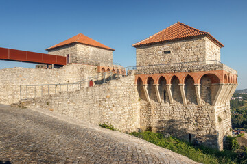 Ourém, Portugal - May 10, 2024: Bastion towers next to the Palace of the Counts in the castle of Ourém in Portugal, on a sunny afternoon.