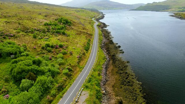 Killary Harbour or Killary fjord and Connemara Loop scenic route aerial view. A stunning fjord in the west of Ireland. Dramatic natural border between co. Galway and co. Mayo. Wild Atlantic Way.