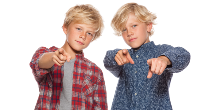 Two boys with blonde hair, wearing casual clothing, pointing at camera with playful expressions