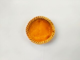 A delicious milk pie with a white background. This milk pie is typical of Bali, Indonesia, with a...