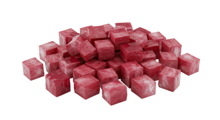 Pile of fresh raw diced beef cubes in a close up studio shot on black