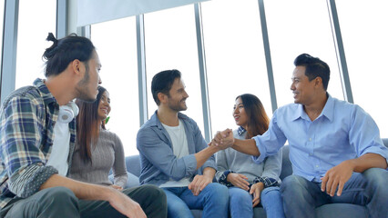 Diversity multi ethnic group brainstorming teams with business partner meeting and share ideas in...