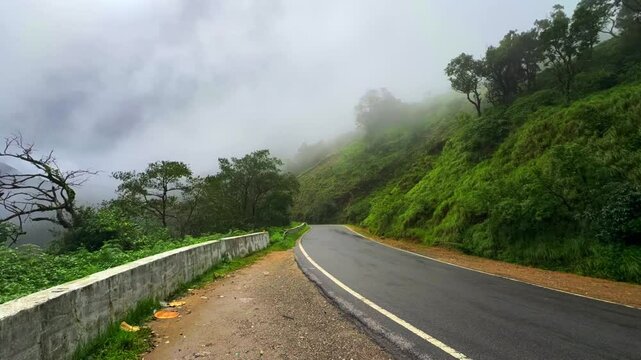 Timelapse Video of road on Mountain at Rainy Season, charmadi karnataka india
