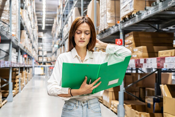 Large storage facility, Young woman diligently checking her clipboard as she organizes and oversees the supplies, but she forgot detail, feeling stressed, mistake while Exploring the warehouse