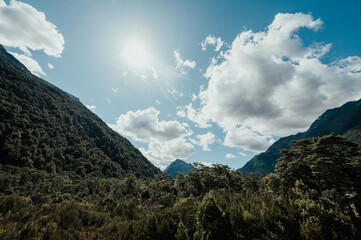 Mountain landscape with clouds on Milford Track, New Zealand