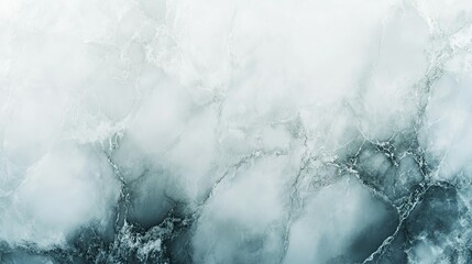 An abstract design featuring a marble-like pattern in pale teal and white tones.