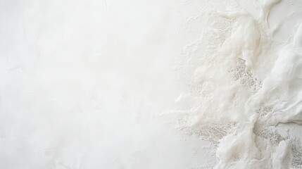 Obraz premium Abstract textured surface in shades of white.