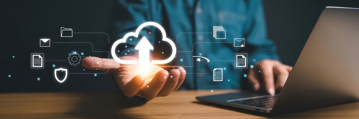 A person's hand interacting with a digital cloud upload interface.