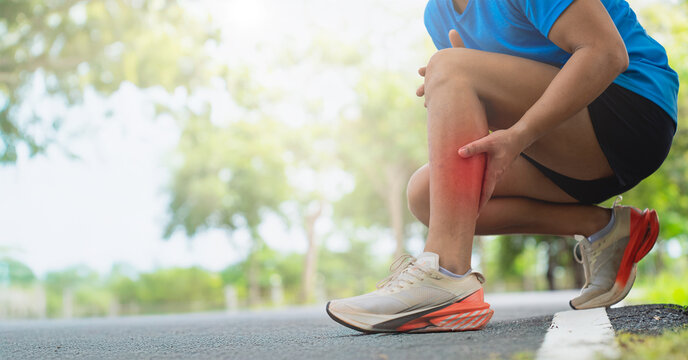Runner Suffering from Shin Splints Outdoor Exercise