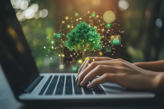 Hands typing on a laptop with a digital tree graphic.