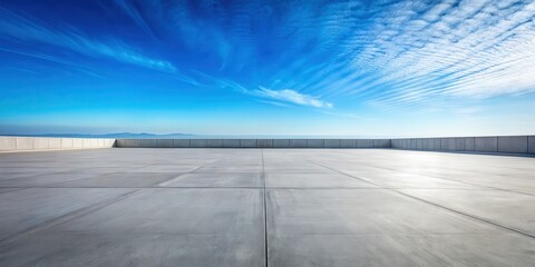 Expansive Concrete Plaza with a Panoramic View of a Serene Horizon Under a Vivid Blue Sky