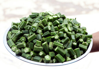 Top view of Chopped Fresh Okra in Steel plate