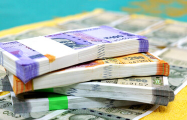 piles of new indian currency notes rupees 50,100,200 and 50\