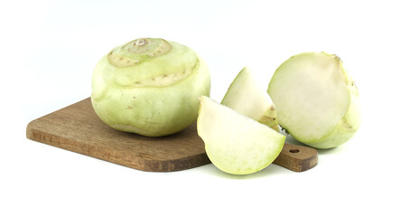 Fresh Kohlrabi Whole and Sliced on Wooden Cutting Board Isolated on White Background