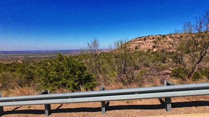 Texas Panhandle is characterized by dramatic canyon landforms, primarily due to the erosive power of rivers and wind over millions of years.