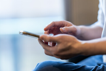 man using smart phone. The concept of living on vacation and playing social media. Social Distancing ,Working From Home