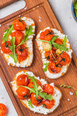 Bruschetta with ricotta and baked tomatoes