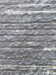 loosely arranged rocks used for building fences background texture