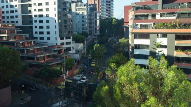 Time-lapse of panoramic view of car traffic on the streets of the northern part of Quito during the morning - Ecuador