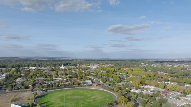 Aerial: Drone shot flying over Wagga Wagga cricket ground in NSW Australia