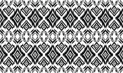 Hand draw Ikat floral paisley embroidery.Ikat ethnic oriental pattern traditional.great for background ,curtain, carpet, wallpaper, clothing, wrapping,batik,clothing or decorations.Vector illustration