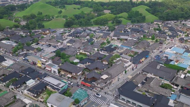 Filming by spinning a drone along Hwangridan-gil, a busy street where traditional houses in Gyeongju are gathered