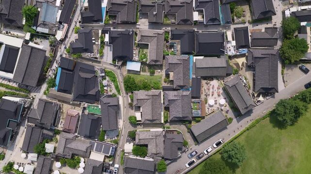 The traditional houses of Gyeongju are located on Hwangridan-gil, the main street, and the roof of the hanok is photographed by moving from the tower with a drone