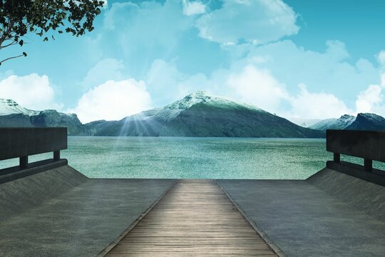 Fototapeta Wooden walkway jutting over turquoise lake, flanking concrete slabs, revealing snow-capped peaks