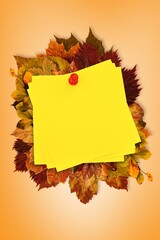Fototapeta premium Autumn leaves with yellow note