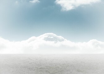 Flat design illustrating barren ground stretching toward dense low-lying cloud bank under clear sky