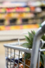 Pineapple in shopping cart