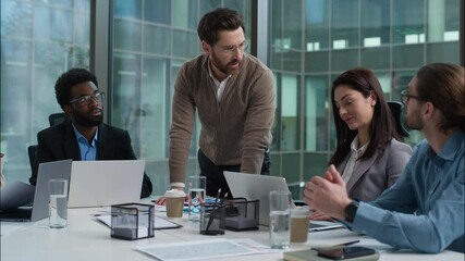 Multiracial business group multiethnic women men businesspeople office meeting briefing Caucasian leader talking discussing planning African American Indian employes team coworkers negotiation startup - Powered by Adobe