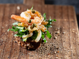 Open sandwich on a cutting board