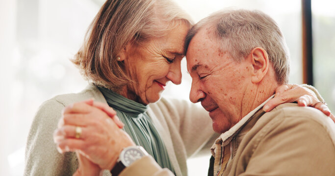 Love, dance and support with old couple in home for romance, bonding and anniversary. Holding hands, smile and trust with elderly man and woman for connection, retirement and solidarity together - Powered by Adobe